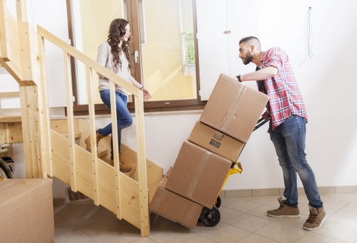 Organized long-term storage unit with labeled boxes and furniture