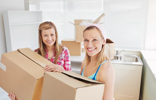 Packed boxes and furniture ready for short-term storage in Winchmorehill