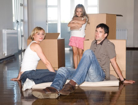 A moving team carefully handling furniture during removals and storage in Winchmorehill